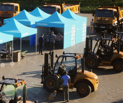 file-meta-description.namiotyreklamoweadsystemnatargachbranżowych,ustawioneobokmaszynrolniczychibudowlanych,zuczestnikamirozmawiającymiprzystoisku.